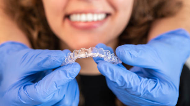 Dentist showing Invisalign