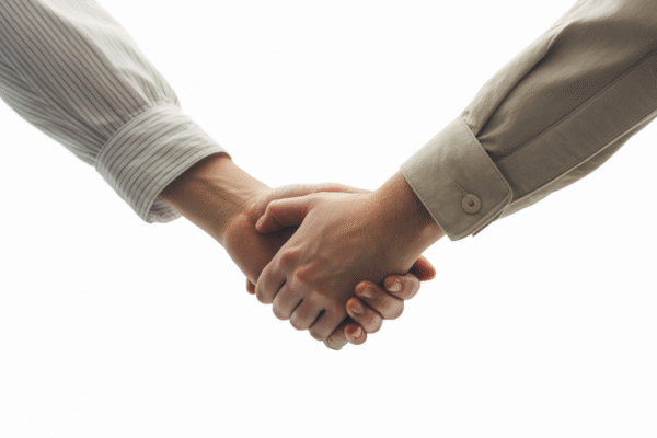 Couple holding hands, representing IVF journey
